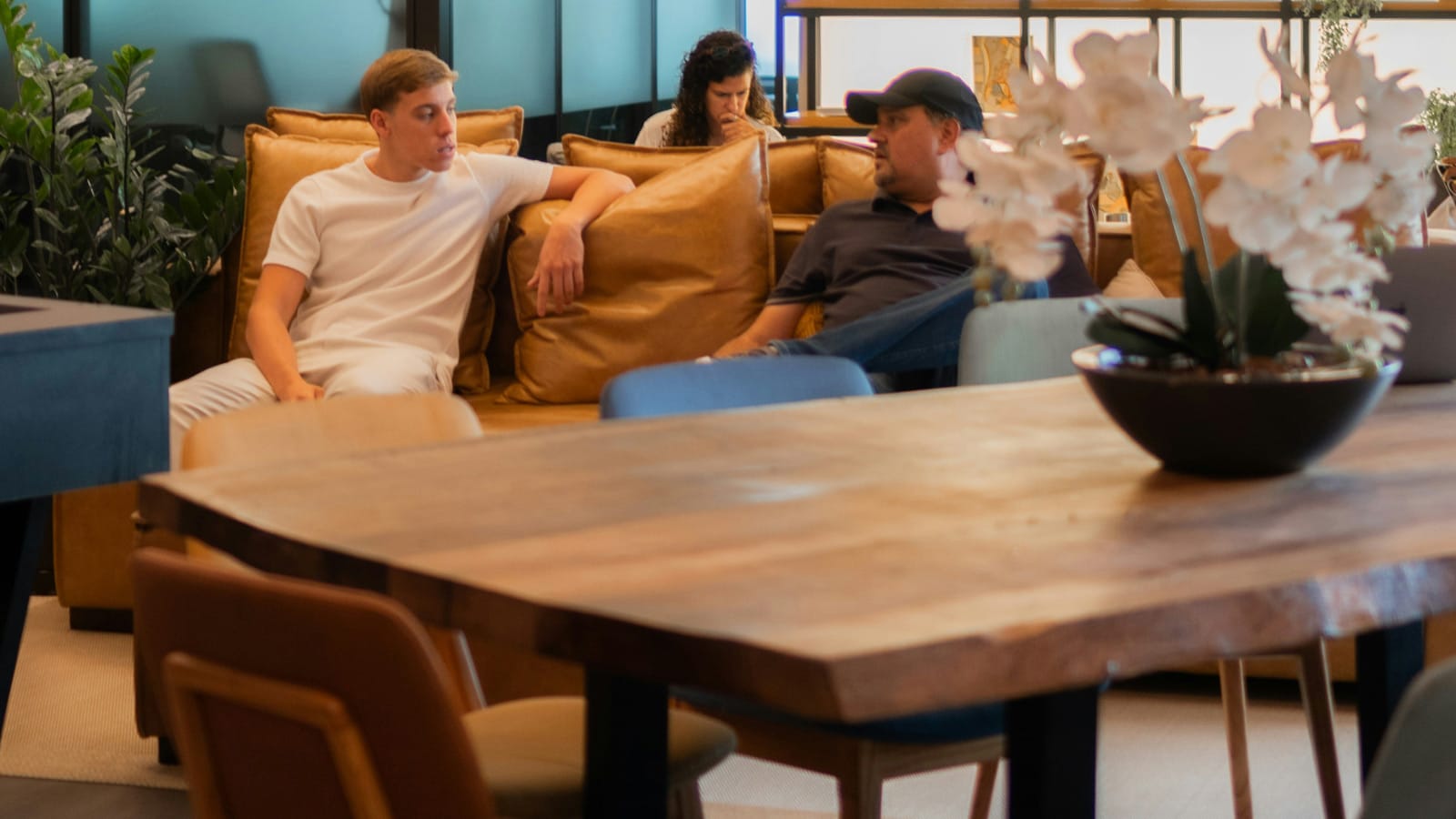 Human resources team meeting together around a table in a modern office
