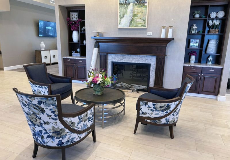 Common area lounge with fireplace at Foundations Health in Marion, Ohio