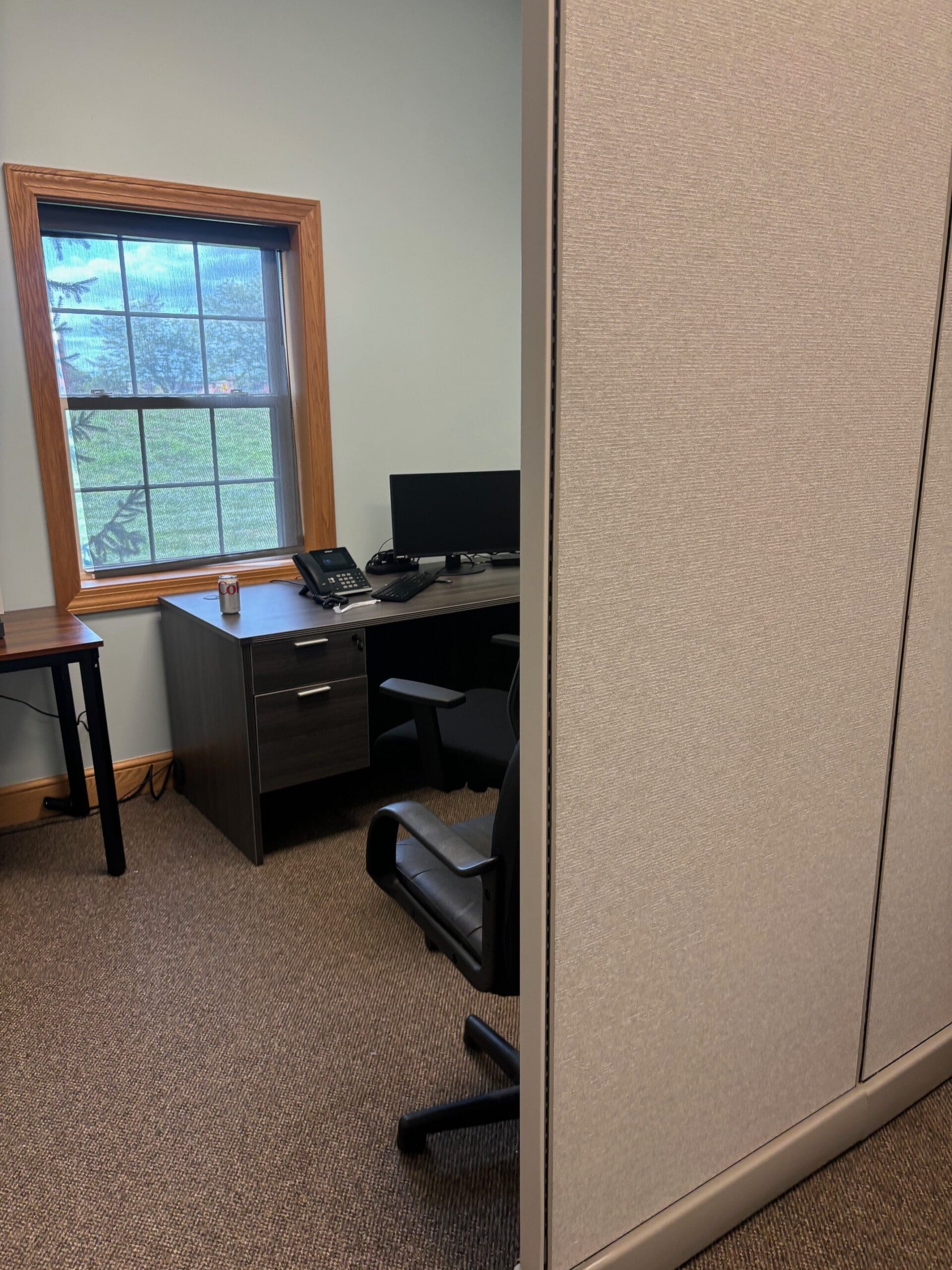 Divider wall with L-Desk behind it